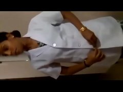 Tamil nurse remove cloths for patients